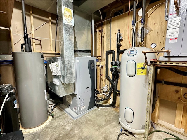 7 Hobart Pl, Grinnell, IA 50112 - utility room featuring water heater and heating unit