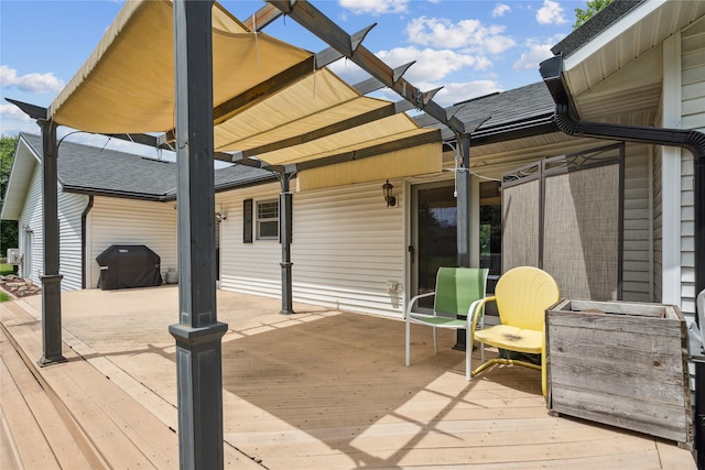 7 Hobart Pl, Grinnell, IA 50112 - wooden terrace featuring a pergola and grilling area