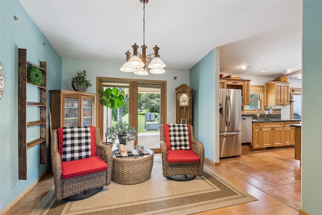7 Hobart Pl, Grinnell, IA 50112 - sitting room with a chandelier and light tile patterned flooring