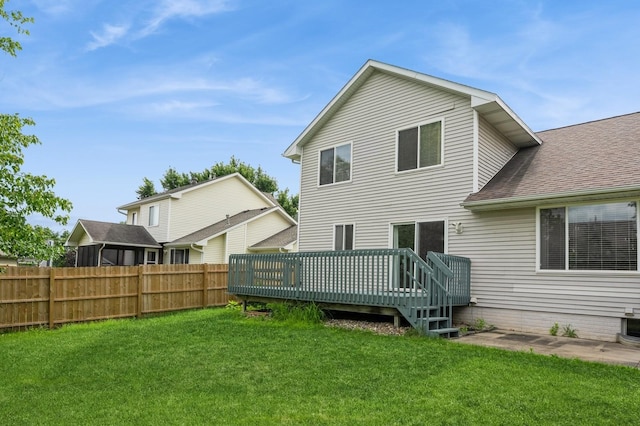 681 63rd St, West Des Moines, IA 50266 - back of property featuring a deck and roof with shingles