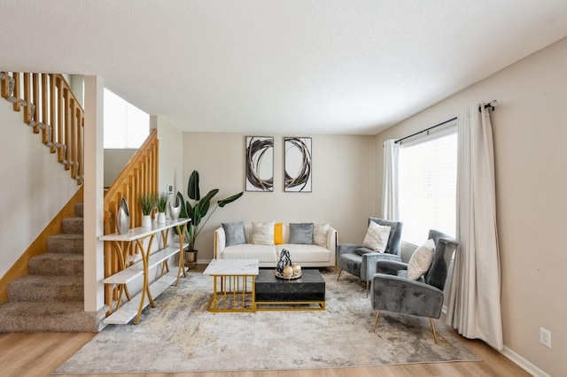 681 63rd St, West Des Moines, IA 50266 - living room with wood finished floors and stairway