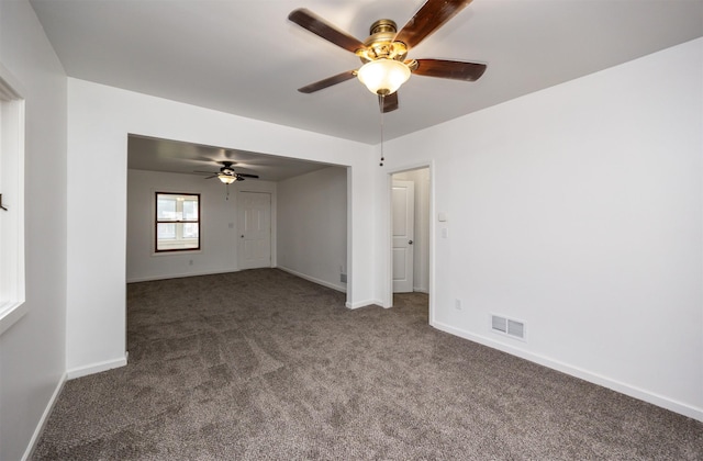 816 Boyd St, Des Moines, IA 50316 - carpeted spare room featuring ceiling fan and baseboards