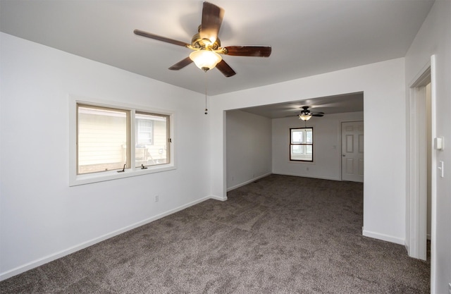 816 Boyd St, Des Moines, IA 50316 - carpeted spare room with ceiling fan