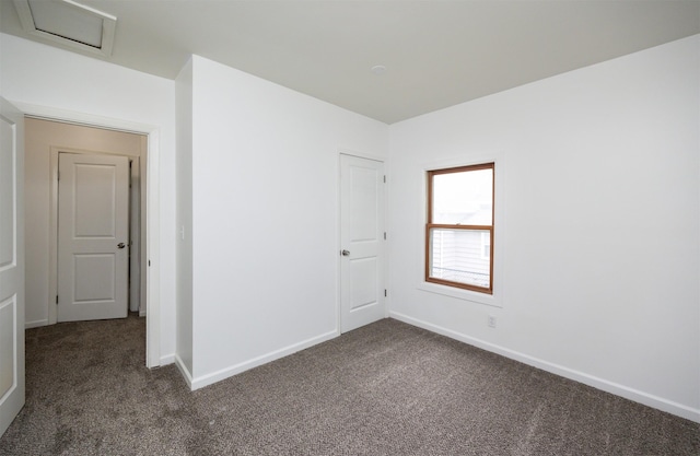 816 Boyd St, Des Moines, IA 50316 - unfurnished room with dark colored carpet and baseboards