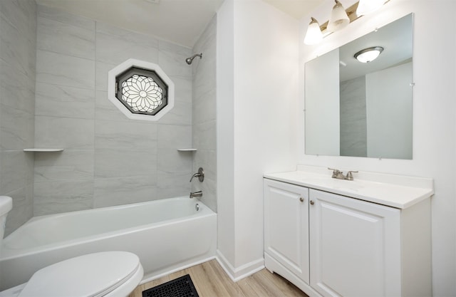 816 Boyd St, Des Moines, IA 50316 - bathroom with wood finished floors, shower / tub combination, and vanity