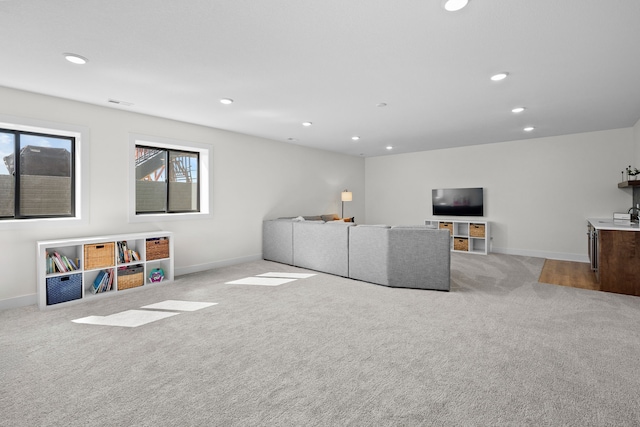 2309 NW 29th St, Ankeny, IA 50023 - unfurnished living room with carpet floors and recessed lighting