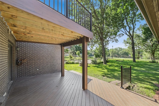 6542 Washington Ave, Windsor Heights, IA 50324 - wooden terrace featuring a lawn