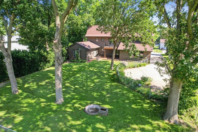 6542 Washington Ave, Windsor Heights, IA 50324 - fenced backyard with a balcony