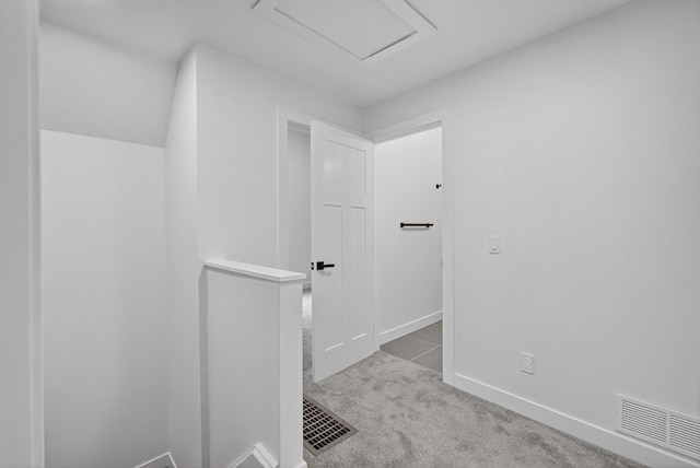 1124 13th St, Des Moines, IA 50314 - corridor with carpet and baseboards