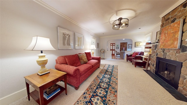 3827 Carpenter Ave, Des Moines, IA 50311 - living area with arched walkways, crown molding, light carpet, and a fireplace