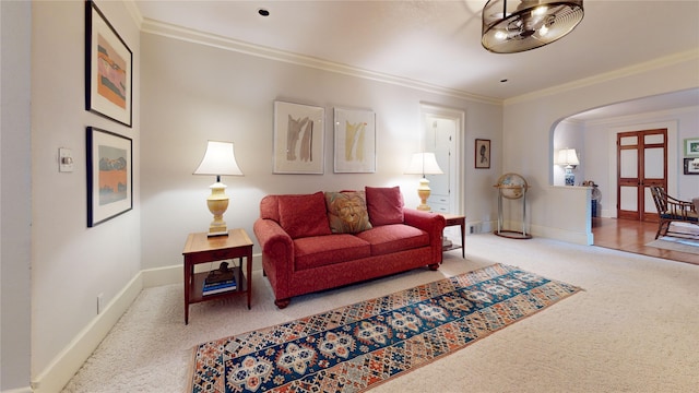 3827 Carpenter Ave, Des Moines, IA 50311 - carpeted living area with arched walkways and ornamental molding