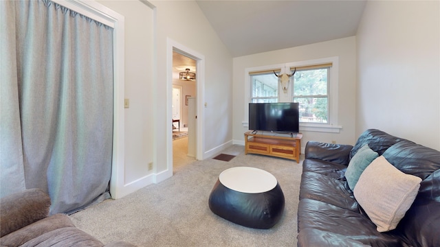 3827 Carpenter Ave, Des Moines, IA 50311 - living room featuring carpet and lofted ceiling