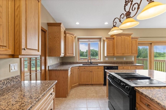 704 SW Coventry Cir, Ankeny, IA 50023 - kitchen with black electric range oven, plenty of natural light, dark stone counters, and recessed lighting