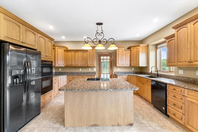 704 SW Coventry Cir, Ankeny, IA 50023 - kitchen with black appliances, a center island, stone counters, light tile patterned flooring, and recessed lighting