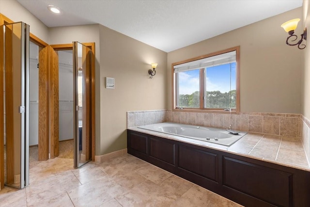 704 SW Coventry Cir, Ankeny, IA 50023 - bathroom with a garden tub