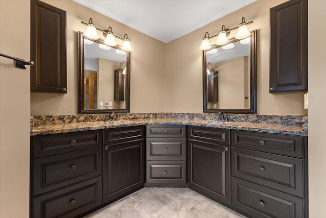 704 SW Coventry Cir, Ankeny, IA 50023 - bathroom featuring double vanity and tile patterned floors