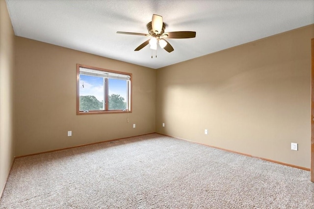 704 SW Coventry Cir, Ankeny, IA 50023 - carpeted empty room with ceiling fan and baseboards