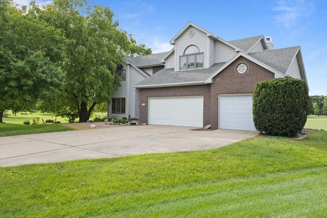 704 SW Coventry Cir, Ankeny, IA 50023 - view of front of home featuring a chimney, driveway, a shingled roof, and a front yard