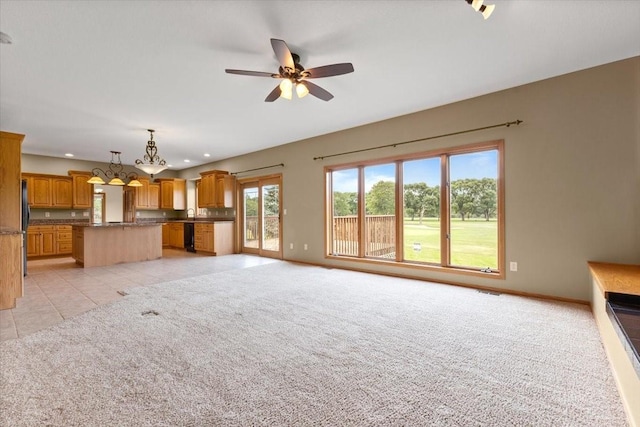 704 SW Coventry Cir, Ankeny, IA 50023 - unfurnished living room with ceiling fan, light colored carpet, recessed lighting, and light tile patterned floors