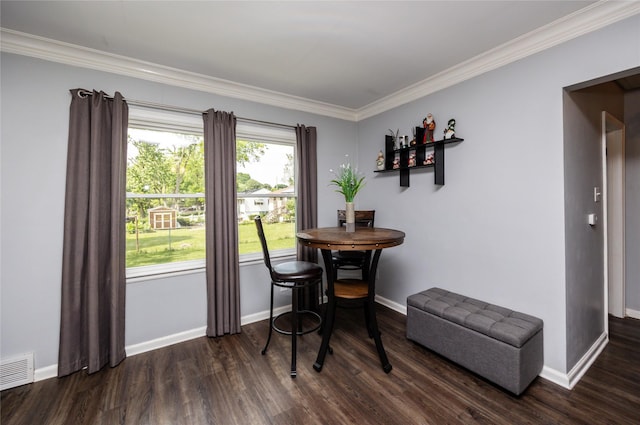 4207 Madison Ave, Des Moines, IA 50310 - dining area with ornamental molding and dark wood-type flooring