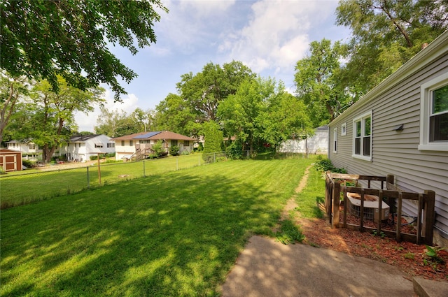 4207 Madison Ave, Des Moines, IA 50310 - fenced backyard featuring a storage shed