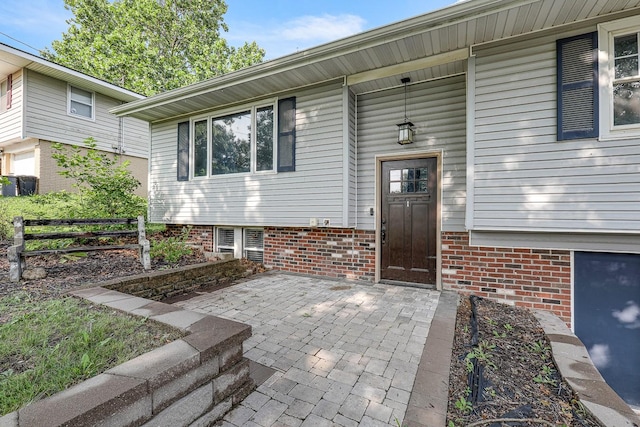1018 S 5th St, Knoxville, IA 50138 - property entrance featuring brick siding