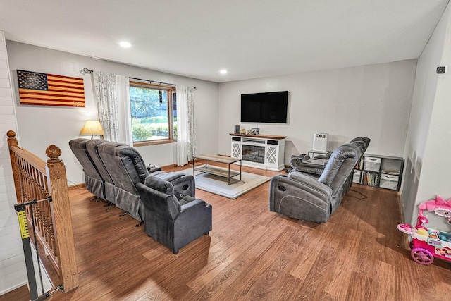 1018 S 5th St, Knoxville, IA 50138 - living area with wood finished floors and recessed lighting