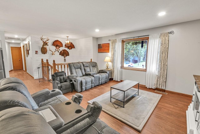 1018 S 5th St, Knoxville, IA 50138 - living area with recessed lighting and light wood finished floors