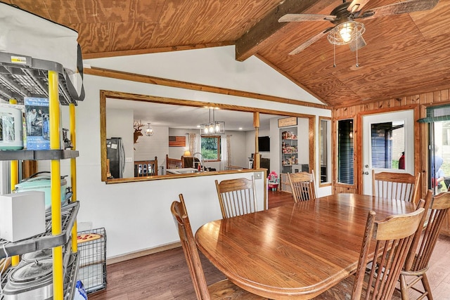 1018 S 5th St, Knoxville, IA 50138 - dining space with a ceiling fan, wood finished floors, and wooden ceiling
