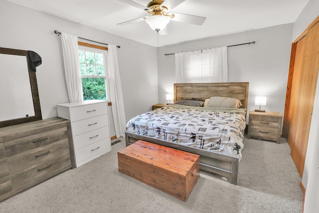 1018 S 5th St, Knoxville, IA 50138 - carpeted bedroom featuring a ceiling fan