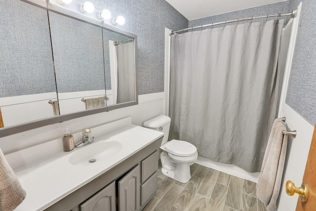1018 S 5th St, Knoxville, IA 50138 - bathroom with vanity and wood tiled floors