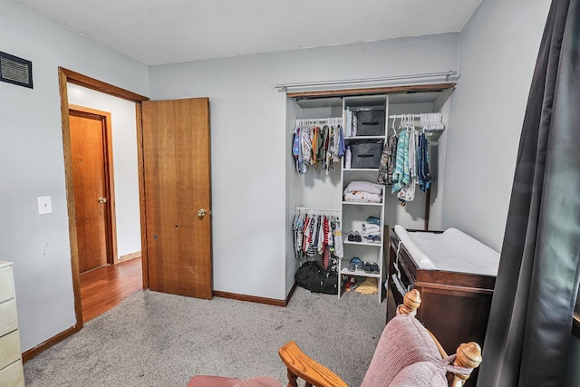 1018 S 5th St, Knoxville, IA 50138 - bedroom featuring carpet and a closet