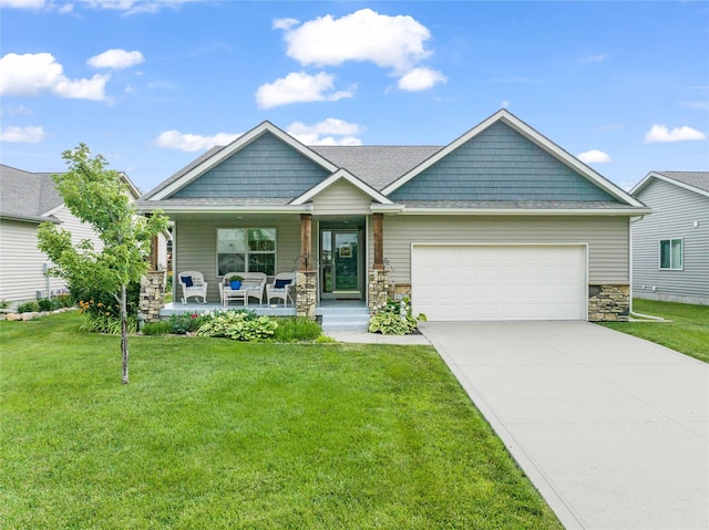 2501 NE Ewing Ct, Grimes, IA 50111 - craftsman inspired home with stone siding, a garage, a porch, concrete driveway, and a front lawn