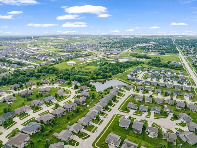 2501 NE Ewing Ct, Grimes, IA 50111 - aerial overview of property's location featuring a nearby body of water and nearby suburban area