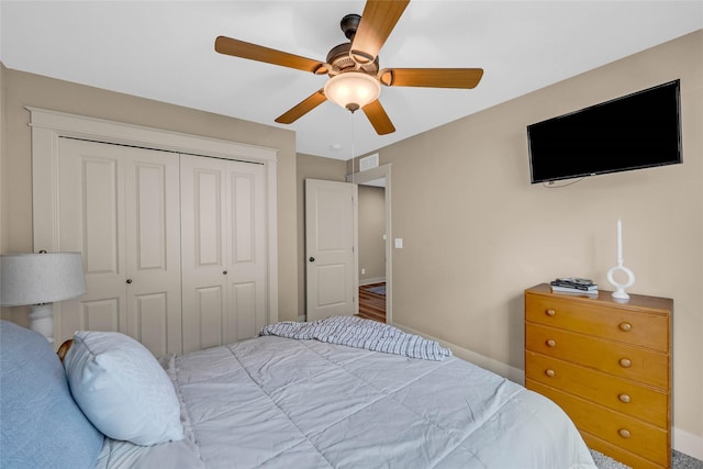 2501 NE Ewing Ct, Grimes, IA 50111 - bedroom featuring a closet and a ceiling fan