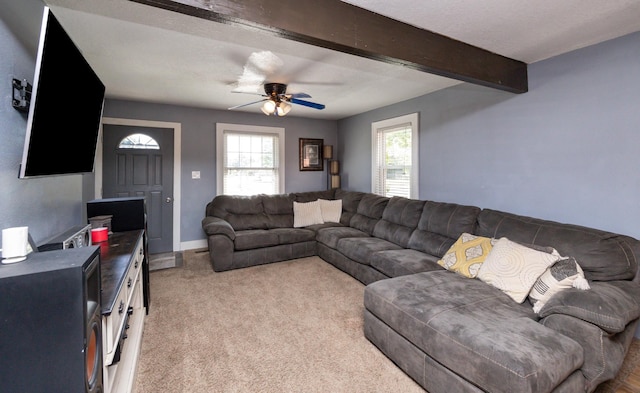 524 1st St, West Des Moines, IA 50265 - living area featuring ceiling fan, beam ceiling, and light colored carpet