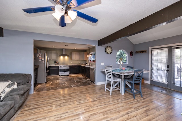 524 1st St, West Des Moines, IA 50265 - dining room featuring wood finished floors and ceiling fan