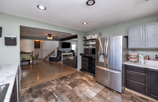 524 1st St, West Des Moines, IA 50265 - kitchen with stainless steel appliances, a textured ceiling, ceiling fan, and recessed lighting