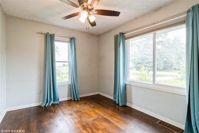 4512 Hickman Rd, Des Moines, IA 50310 - unfurnished room with dark wood-type flooring and a ceiling fan