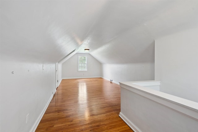 4004 Franklin Ave, Des Moines, IA 50310 - additional living space with lofted ceiling and wood-type flooring
