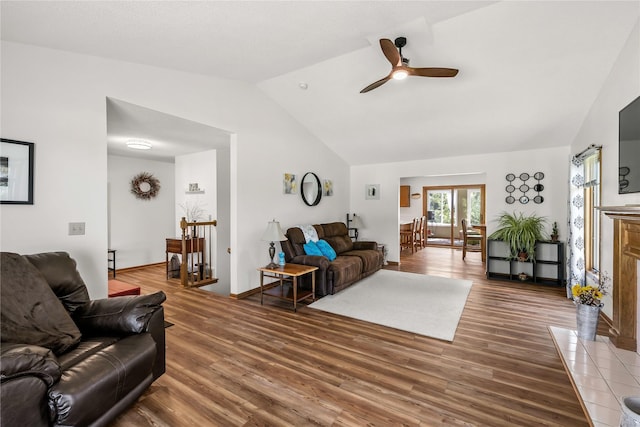 9421 NE 28th Ct, Ankeny, IA 50021 - living area featuring vaulted ceiling, wood finished floors, and ceiling fan