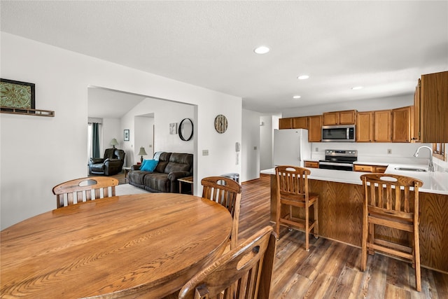 9421 NE 28th Ct, Ankeny, IA 50021 - dining area with wood finished floors and recessed lighting