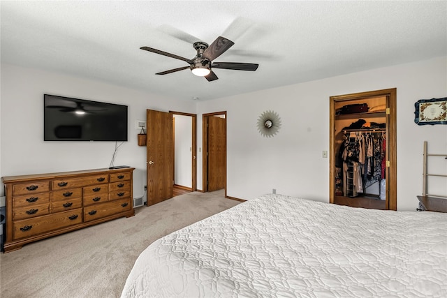 9421 NE 28th Ct, Ankeny, IA 50021 - bedroom featuring carpet floors, a spacious closet, and ceiling fan