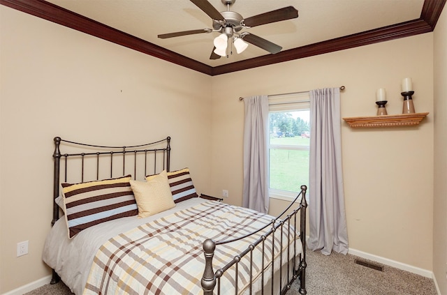 938 15th St SE, Altoona, IA 50009 - bedroom with ornamental molding, carpet floors, and a ceiling fan