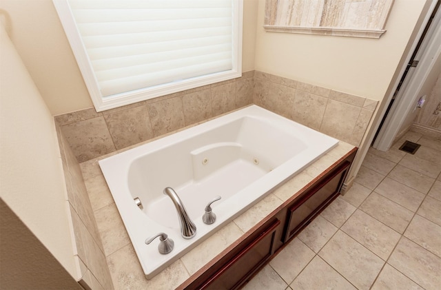 938 15th St SE, Altoona, IA 50009 - full bathroom with a tub with jets and tile patterned flooring