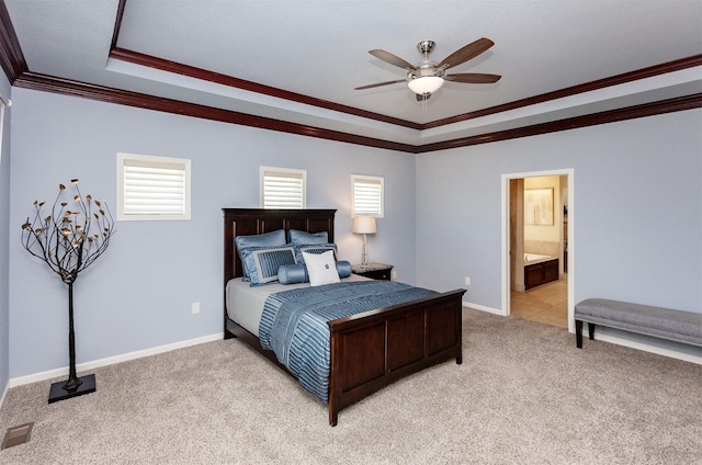 938 15th St SE, Altoona, IA 50009 - bedroom featuring a tray ceiling, light colored carpet, crown molding, and multiple windows