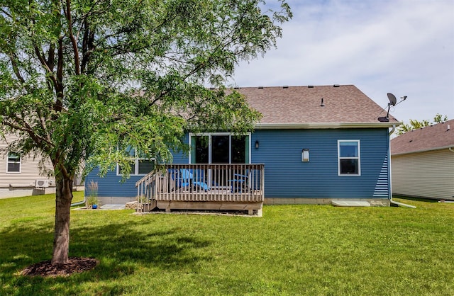 938 15th St SE, Altoona, IA 50009 - rear view of property featuring a wooden deck, a yard, and roof with shingles
