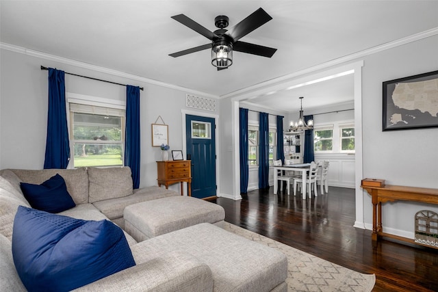 2610 Westover Blvd, Des Moines, IA 50322 - living room with a chandelier, ornamental molding, dark wood-type flooring, and a ceiling fan