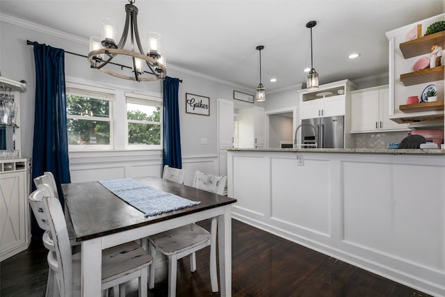 2610 Westover Blvd, Des Moines, IA 50322 - dining space with a chandelier, ornamental molding, dark wood-style flooring, recessed lighting, and wainscoting