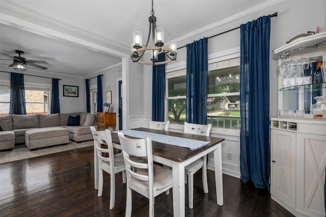 2610 Westover Blvd, Des Moines, IA 50322 - dining space with a chandelier, ornamental molding, dark wood-style flooring, and ceiling fan